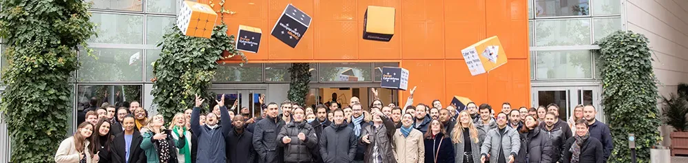 Orange people celebrating the group