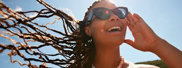 young woman smiling hair in the wind VivaTech image